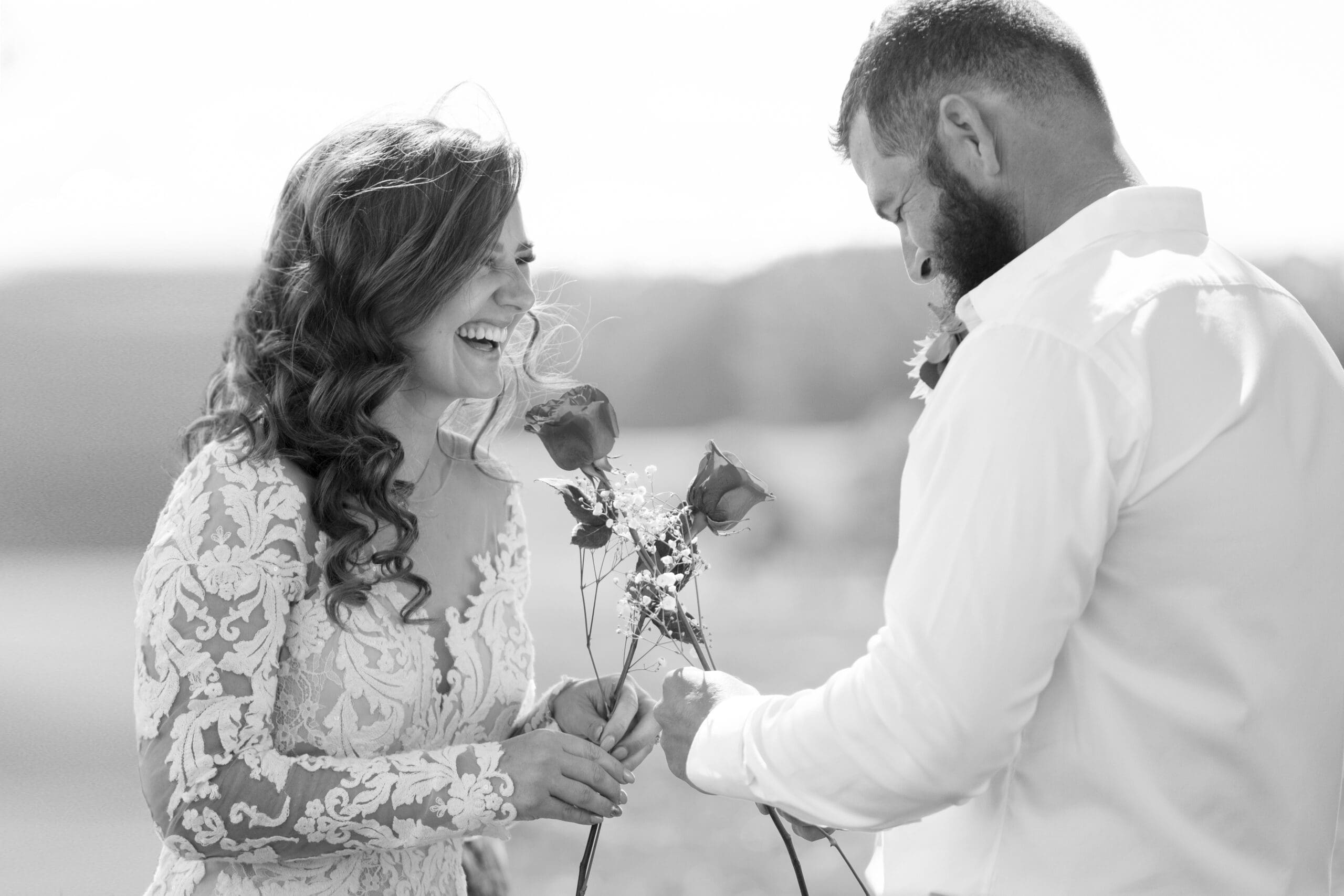Black and white photo of rose ceremony at Country New South Wales wedding