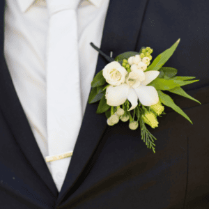 green and white boutonniere