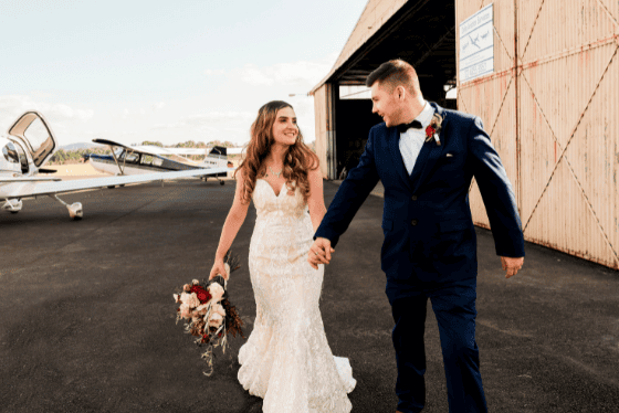 Melissa and Matthew at Camden Airport taking wedding photos