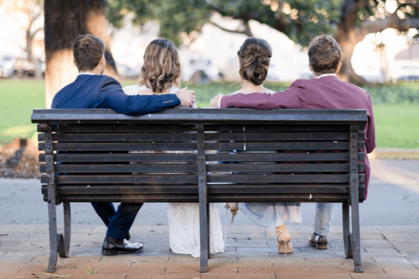 1 Bride groom and wedding party photographed on chair in Perth