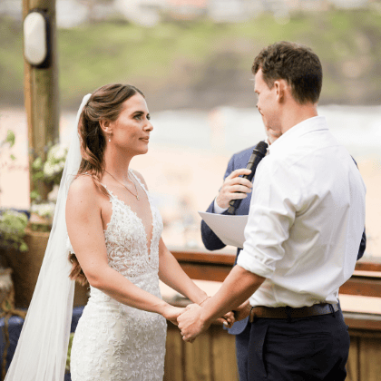 photo of bride and groom during wedding ceremony at Bigola Surf Livesaving Club
