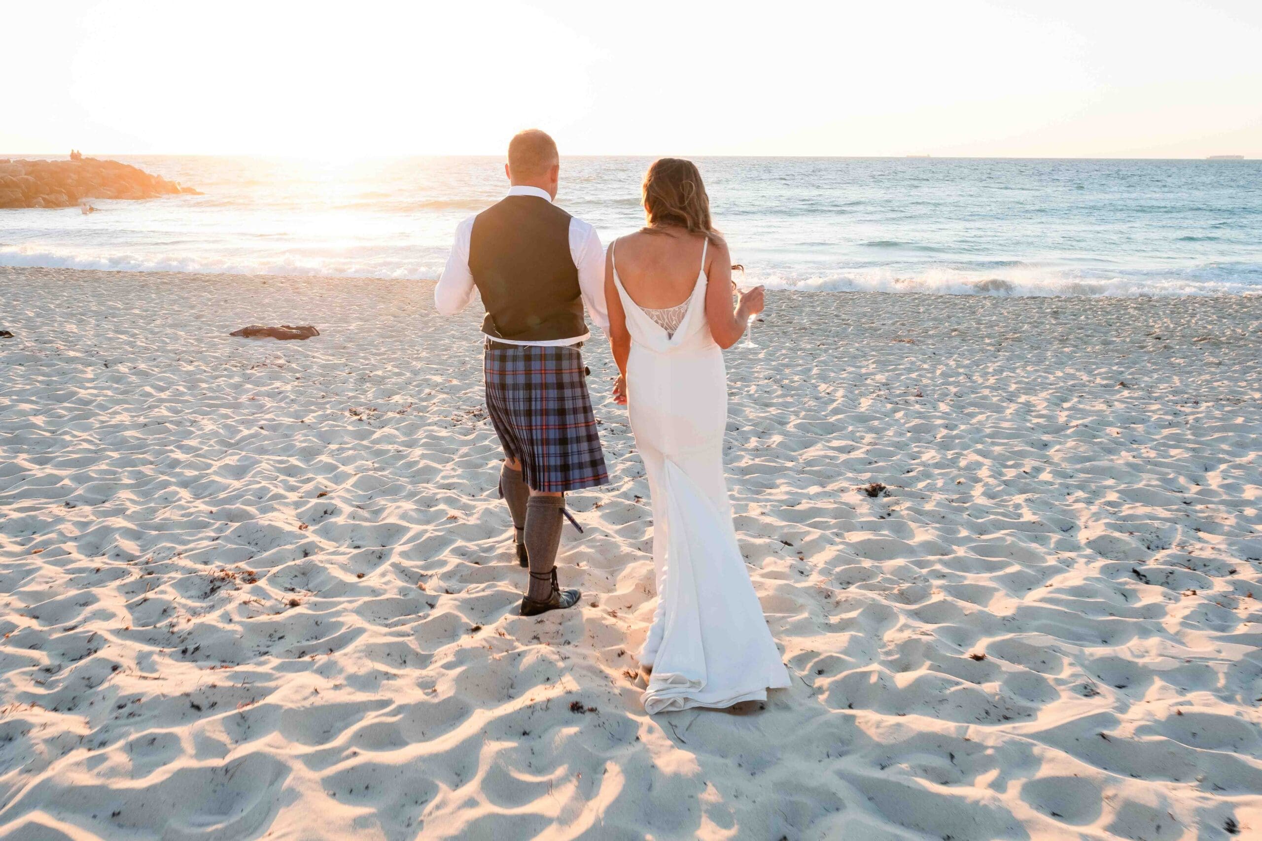 bride and groom on Perth beach at sunset