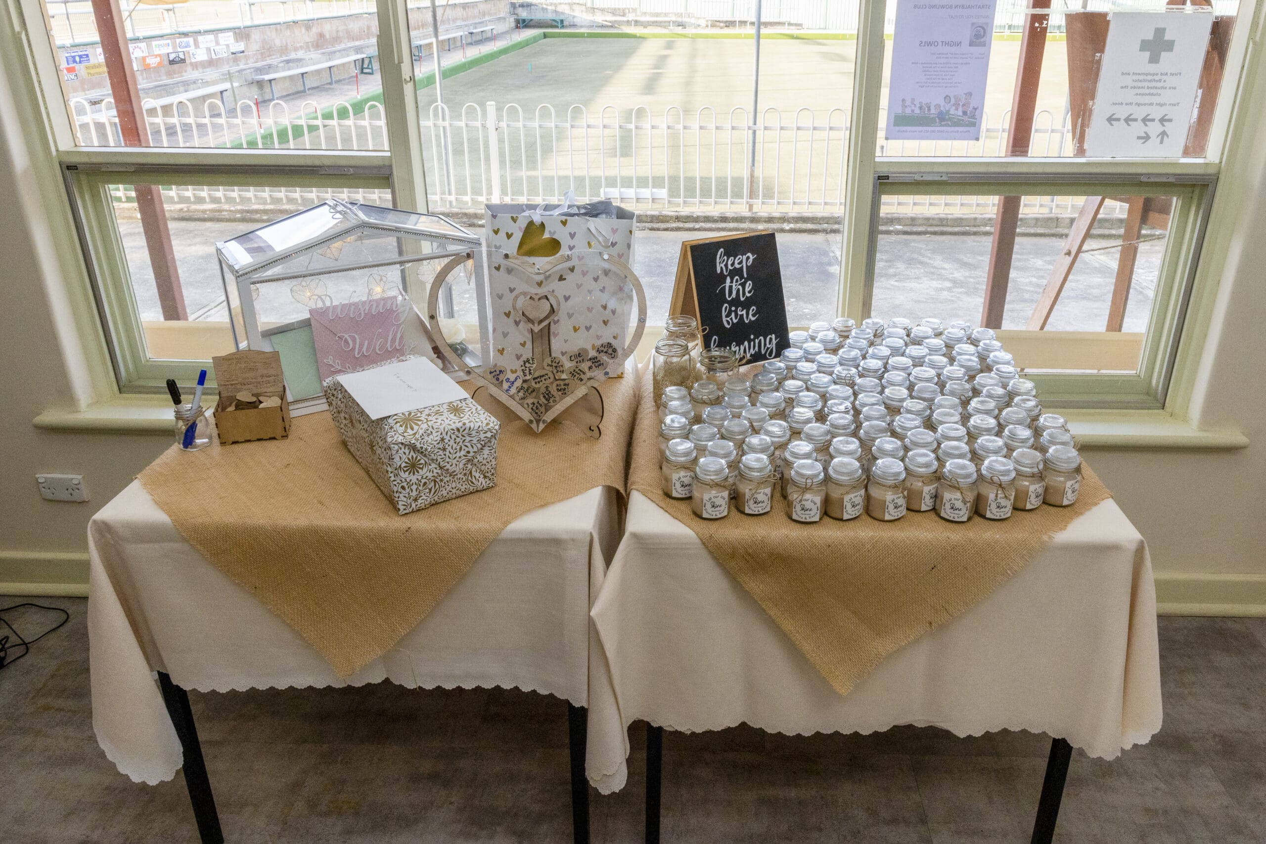 Table with Wedding gifts and wishing well.