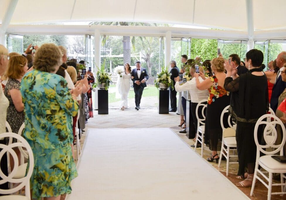bride walking down aisle with Dad