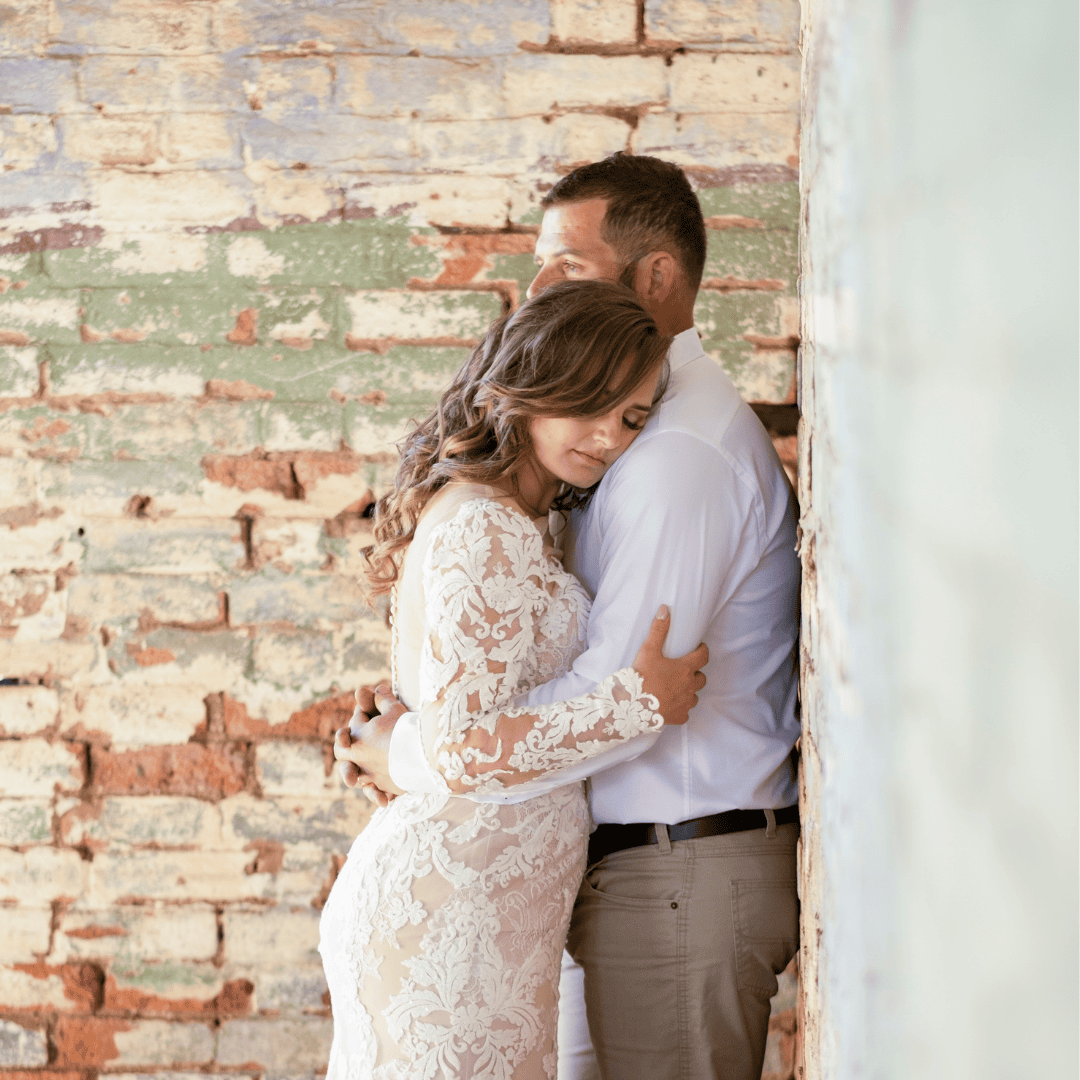 square cropped photo of bride and groom hugging after Country New South Wales wedding