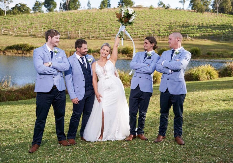 wedding photo of bride and groomsmen at ocean view estates in Brisbane
