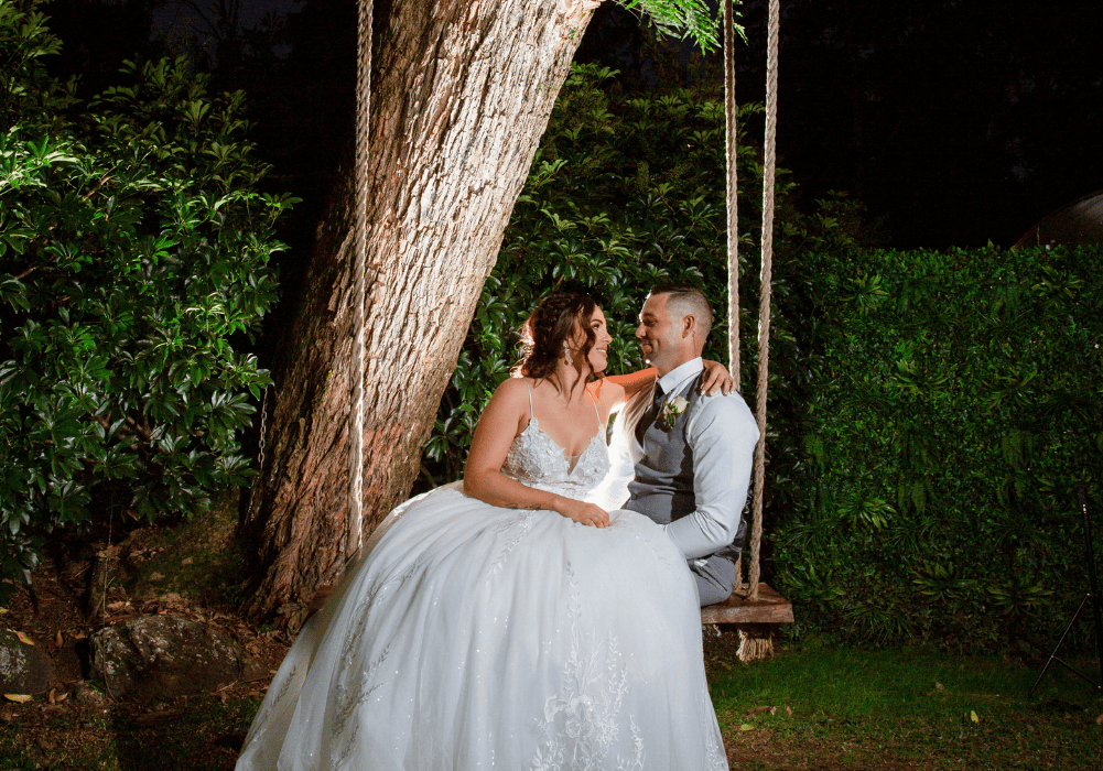 1 bride and groom on swing at Cedar Creek wedding